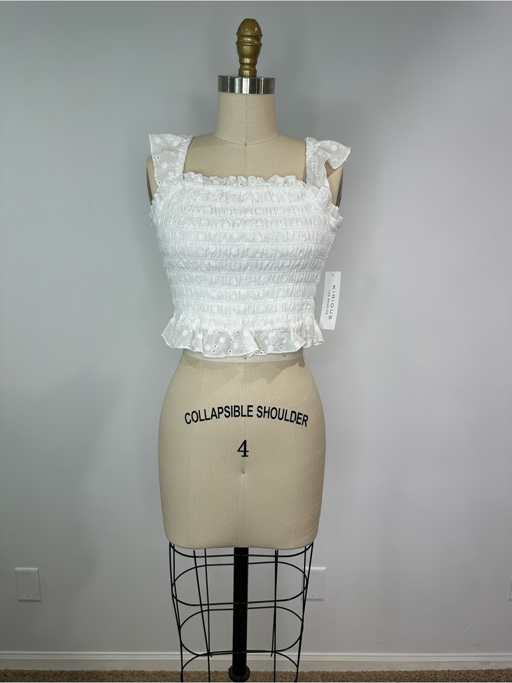 Kirious Los Angeles Smocked Eyelet Ruffle Crop Top - White